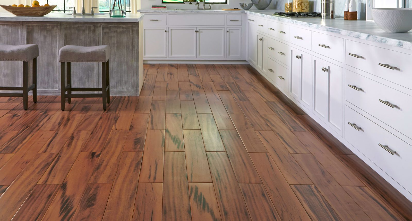 Kitchen with rich, variegated hardwood planks